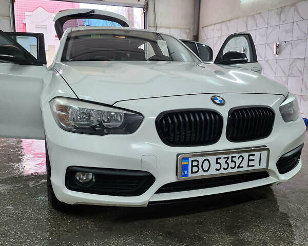 Белый БМВ 1 Серия, объемом двигателя 1.5 л и пробегом 117 тыс. км за 13600 $, фото 1 на Automoto.ua
