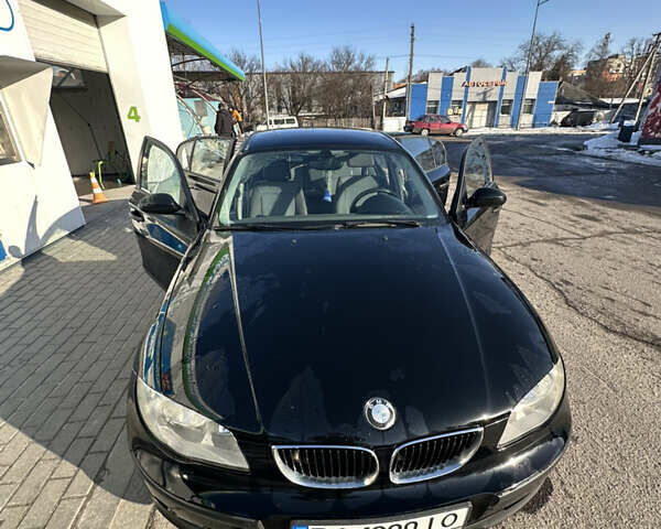 Черный БМВ 1 Серия, объемом двигателя 1.6 л и пробегом 132 тыс. км за 5800 $, фото 1 на Automoto.ua