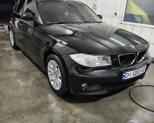 Черный БМВ 1 Серия, объемом двигателя 1.6 л и пробегом 270 тыс. км за 4999 $, фото 1 на Automoto.ua