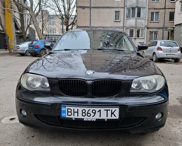 Черный БМВ 1 Серия, объемом двигателя 2 л и пробегом 314 тыс. км за 5600 $, фото 1 на Automoto.ua