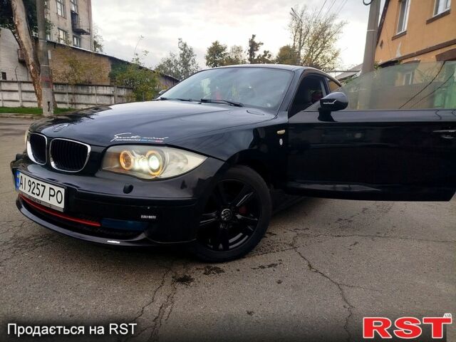 Черный БМВ 1 Серия, объемом двигателя 2 л и пробегом 226 тыс. км за 6000 $, фото 1 на Automoto.ua