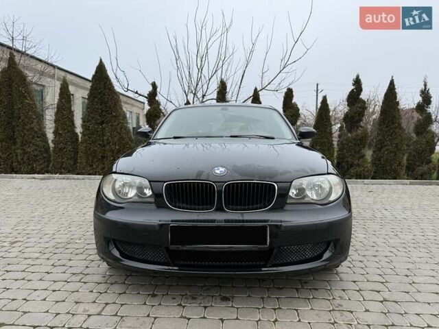 Черный БМВ 1 Серия, объемом двигателя 1.6 л и пробегом 144 тыс. км за 6999 $, фото 1 на Automoto.ua