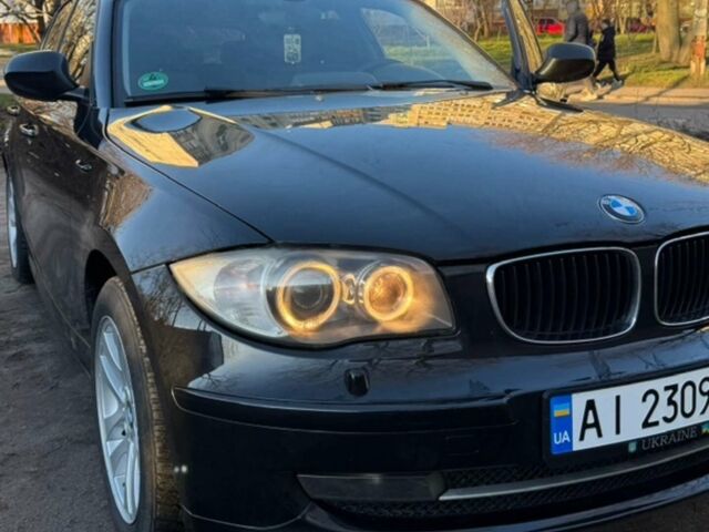 Черный БМВ 1 Серия, объемом двигателя 2 л и пробегом 192 тыс. км за 8500 $, фото 1 на Automoto.ua