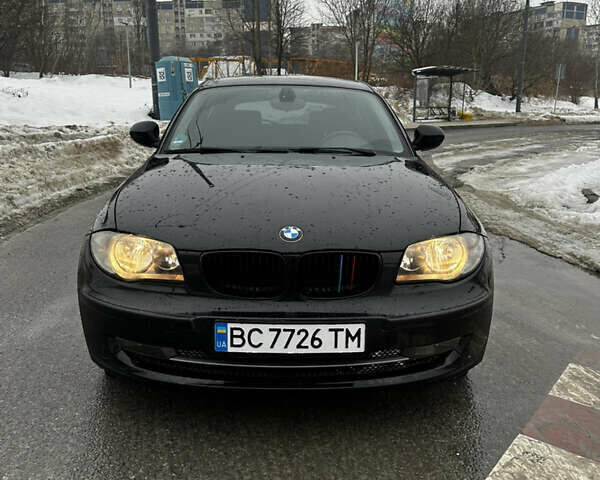 Черный БМВ 1 Серия, объемом двигателя 2 л и пробегом 228 тыс. км за 7200 $, фото 1 на Automoto.ua
