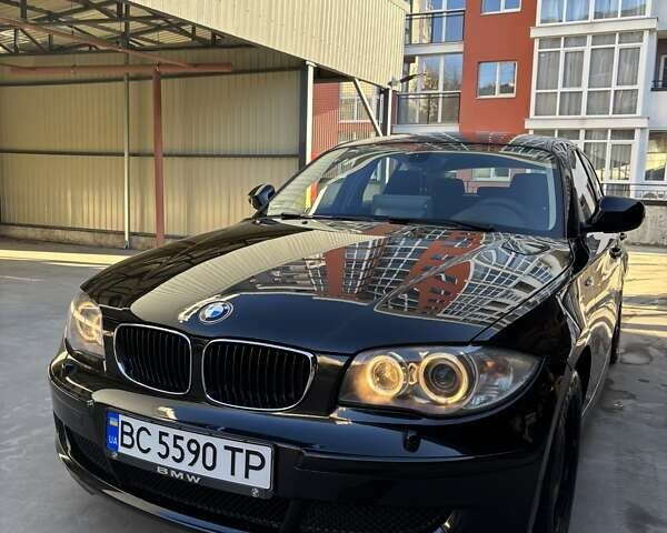Черный БМВ 1 Серия, объемом двигателя 2 л и пробегом 209 тыс. км за 8500 $, фото 1 на Automoto.ua