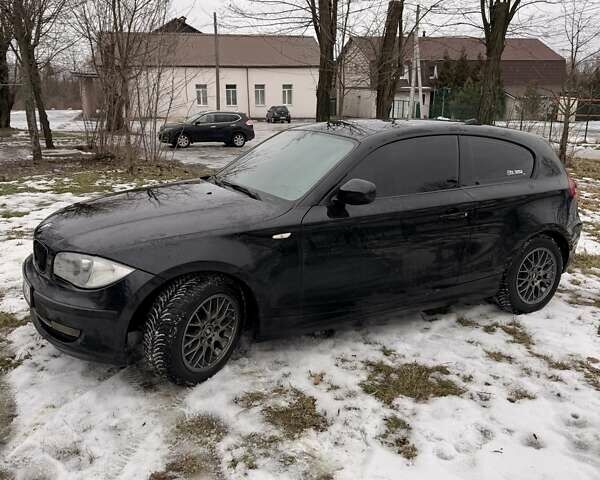 Черный БМВ 1 Серия, объемом двигателя 1.6 л и пробегом 294 тыс. км за 6000 $, фото 1 на Automoto.ua