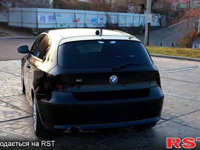 Черный БМВ 1 Серия, объемом двигателя 1.6 л и пробегом 25900 тыс. км за 6500 $, фото 1 на Automoto.ua