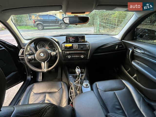 Черный БМВ 1 Серия, объемом двигателя 1.6 л и пробегом 295 тыс. км за 9499 $, фото 1 на Automoto.ua