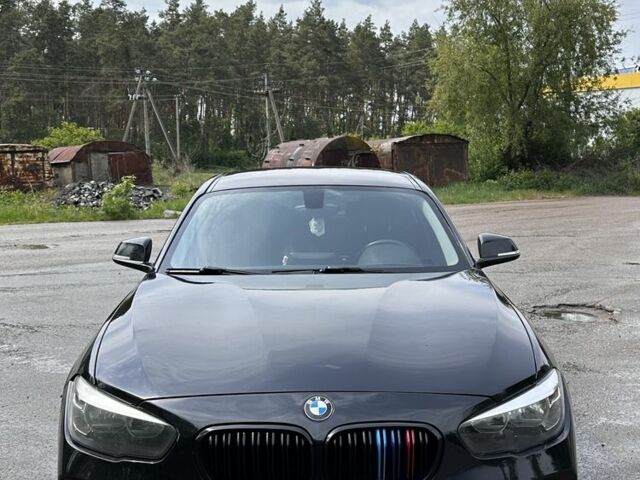 Черный БМВ 1 Серия, объемом двигателя 1.6 л и пробегом 265 тыс. км за 8300 $, фото 1 на Automoto.ua