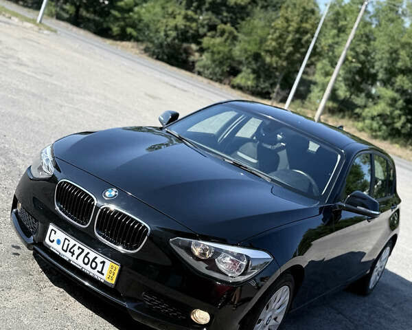 Черный БМВ 1 Серия, объемом двигателя 1.6 л и пробегом 125 тыс. км за 11500 $, фото 1 на Automoto.ua