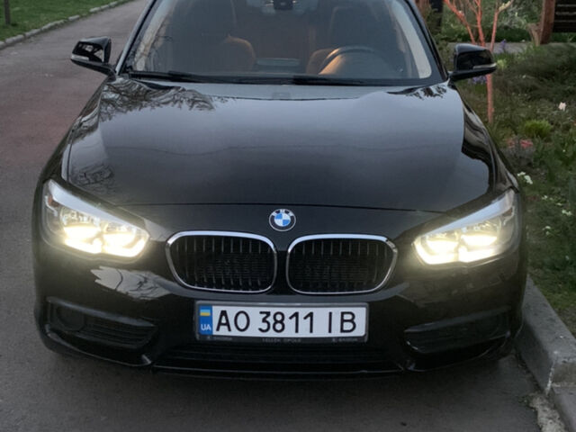 Черный БМВ 1 Серия, объемом двигателя 1.5 л и пробегом 170 тыс. км за 10000 $, фото 1 на Automoto.ua