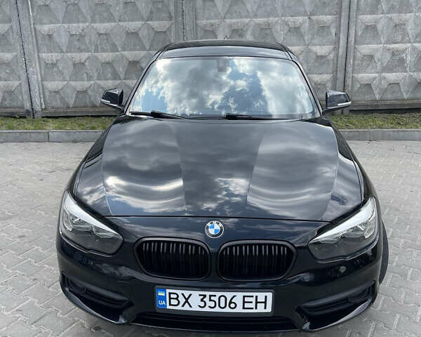 Черный БМВ 1 Серия, объемом двигателя 1.5 л и пробегом 116 тыс. км за 12000 $, фото 1 на Automoto.ua