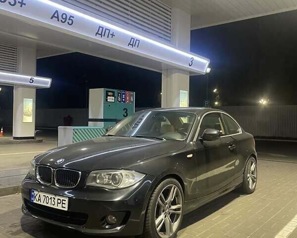 Черный БМВ 1 Серия, объемом двигателя 3 л и пробегом 185 тыс. км за 8399 $, фото 1 на Automoto.ua