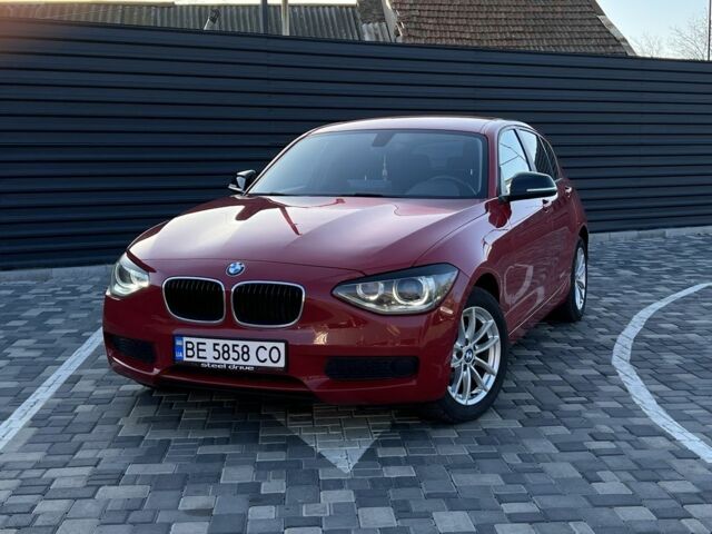 Красный БМВ 1 Серия, объемом двигателя 1.6 л и пробегом 156 тыс. км за 9300 $, фото 1 на Automoto.ua