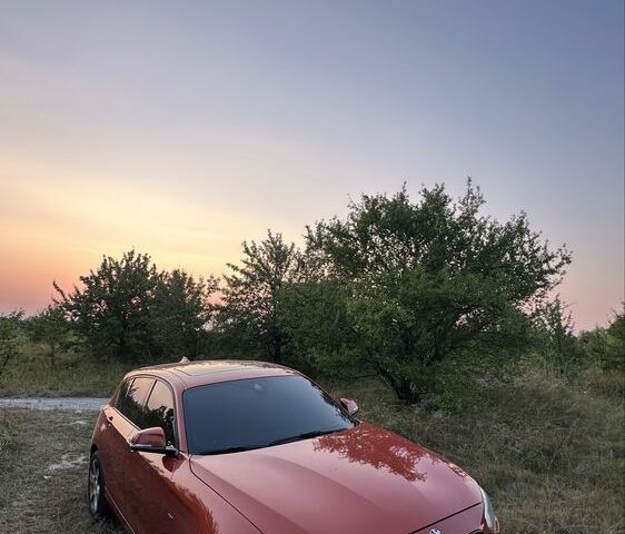 Оранжевый БМВ 1 Серия, объемом двигателя 2 л и пробегом 339 тыс. км за 16098 $, фото 1 на Automoto.ua
