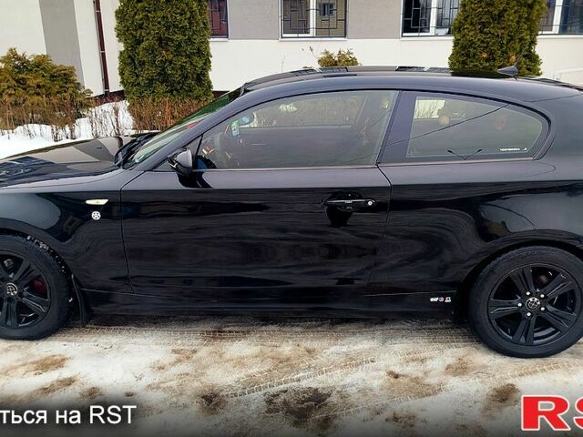 Черный БМВ 118, объемом двигателя 2 л и пробегом 22600 тыс. км за 6000 $, фото 1 на Automoto.ua