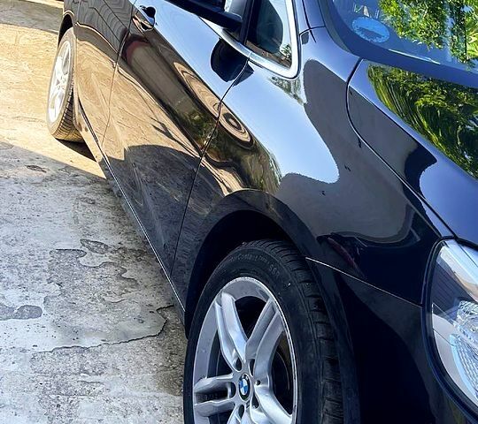 Черный БМВ 2 Серия, объемом двигателя 2 л и пробегом 218 тыс. км за 18999 $, фото 1 на Automoto.ua