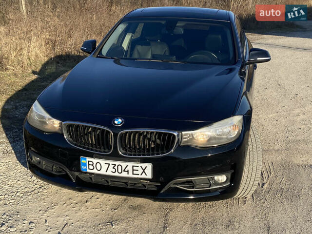 Черный БМВ 3 Серия ГТ, объемом двигателя 2 л и пробегом 213 тыс. км за 13999 $, фото 1 на Automoto.ua