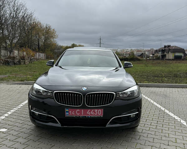 Чорний БМВ 3 Серія ГТ, об'ємом двигуна 2 л та пробігом 124 тис. км за 13999 $, фото 1 на Automoto.ua