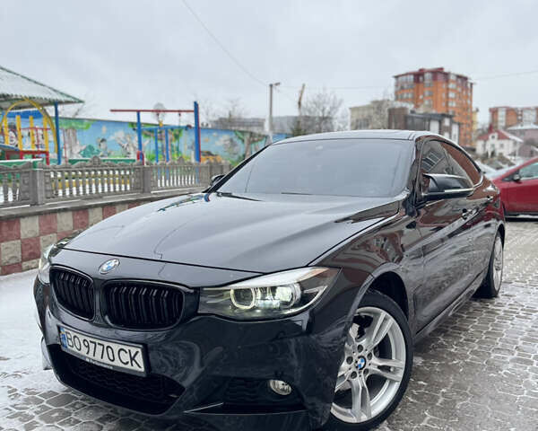 Черный БМВ 3 Серия ГТ, объемом двигателя 2 л и пробегом 103 тыс. км за 15500 $, фото 1 на Automoto.ua