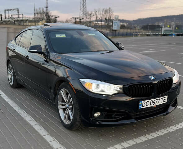 Чорний БМВ 3 Серія ГТ, об'ємом двигуна 2 л та пробігом 129 тис. км за 18900 $, фото 1 на Automoto.ua