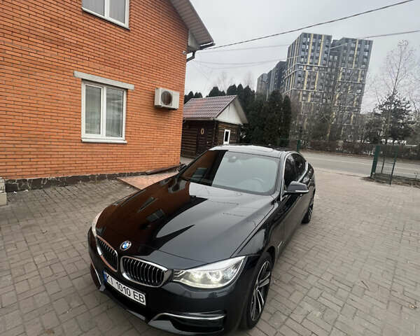 Черный БМВ 3 Серия ГТ, объемом двигателя 2.98 л и пробегом 180 тыс. км за 22000 $, фото 1 на Automoto.ua