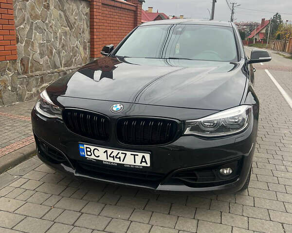 Черный БМВ 3 Серия ГТ, объемом двигателя 2 л и пробегом 170 тыс. км за 18700 $, фото 1 на Automoto.ua