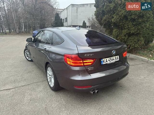 Серый БМВ 3 Серия ГТ, объемом двигателя 2 л и пробегом 158 тыс. км за 16000 $, фото 1 на Automoto.ua