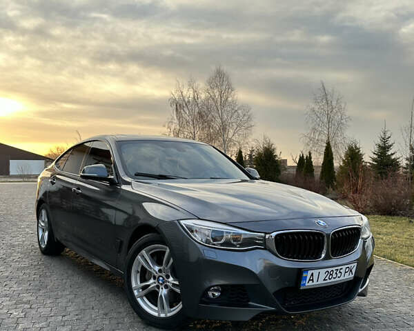 Серый БМВ 3 Серия ГТ, объемом двигателя 2.98 л и пробегом 168 тыс. км за 14000 $, фото 1 на Automoto.ua