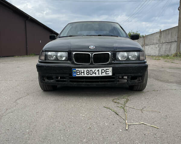 Черный БМВ 3 Серия, объемом двигателя 1.6 л и пробегом 193 тыс. км за 3200 $, фото 1 на Automoto.ua