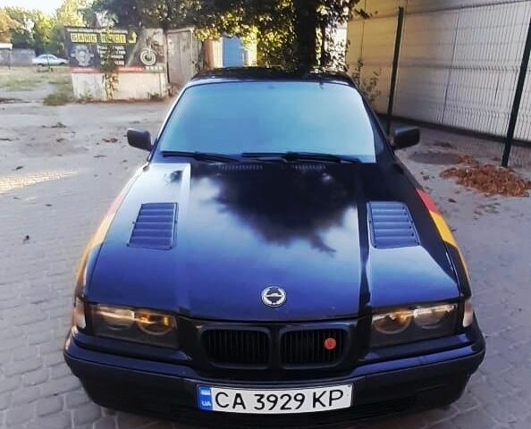 Чорний БМВ 3 Серія, об'ємом двигуна 2.5 л та пробігом 300 тис. км за 5950 $, фото 1 на Automoto.ua