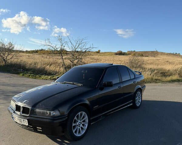 Черный БМВ 3 Серия, объемом двигателя 1.8 л и пробегом 368 тыс. км за 2499 $, фото 1 на Automoto.ua