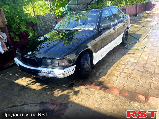 Черный БМВ 3 Серия, объемом двигателя 2.5 л и пробегом 200 тыс. км за 2500 $, фото 1 на Automoto.ua