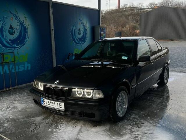 Черный БМВ 3 Серия, объемом двигателя 1.8 л и пробегом 520 тыс. км за 2650 $, фото 1 на Automoto.ua