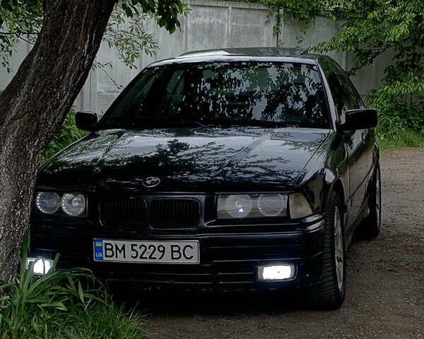 Черный БМВ 3 Серия, объемом двигателя 1.8 л и пробегом 290 тыс. км за 2990 $, фото 1 на Automoto.ua