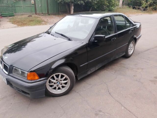 Чорний БМВ 3 Серія, об'ємом двигуна 1.8 л та пробігом 338 тис. км за 1806 $, фото 1 на Automoto.ua