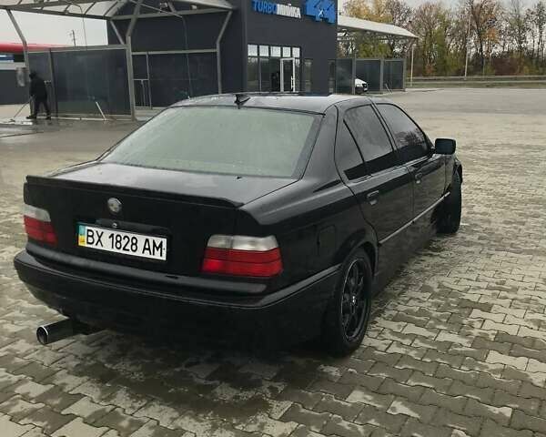 Черный БМВ 3 Серия, объемом двигателя 2 л и пробегом 320 тыс. км за 2450 $, фото 1 на Automoto.ua