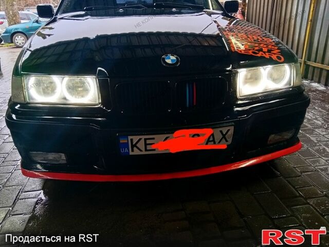 Черный БМВ 3 Серия, объемом двигателя 2.5 л и пробегом 430 тыс. км за 3500 $, фото 1 на Automoto.ua