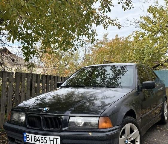 Черный БМВ 3 Серия, объемом двигателя 2.5 л и пробегом 450 тыс. км за 2800 $, фото 1 на Automoto.ua