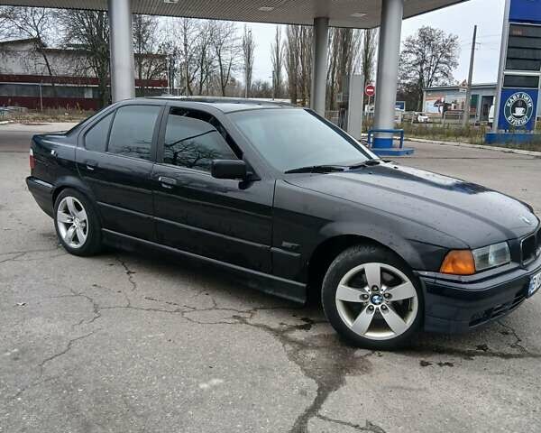 Черный БМВ 3 Серия, объемом двигателя 2.8 л и пробегом 450 тыс. км за 2799 $, фото 1 на Automoto.ua
