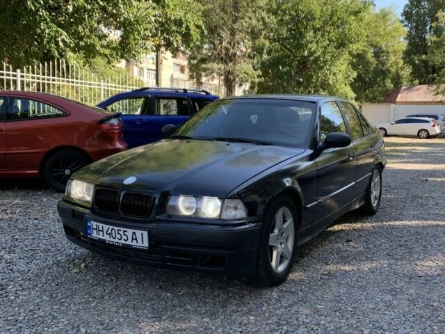 Черный БМВ 3 Серия, объемом двигателя 2.5 л и пробегом 300 тыс. км за 2850 $, фото 1 на Automoto.ua