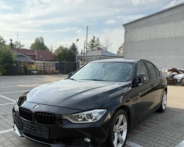 Черный БМВ 3 Серия, объемом двигателя 2 л и пробегом 143 тыс. км за 13855 $, фото 1 на Automoto.ua