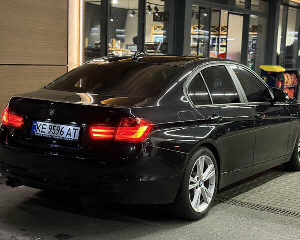 Черный БМВ 3 Серия, объемом двигателя 2 л и пробегом 191 тыс. км за 13800 $, фото 1 на Automoto.ua