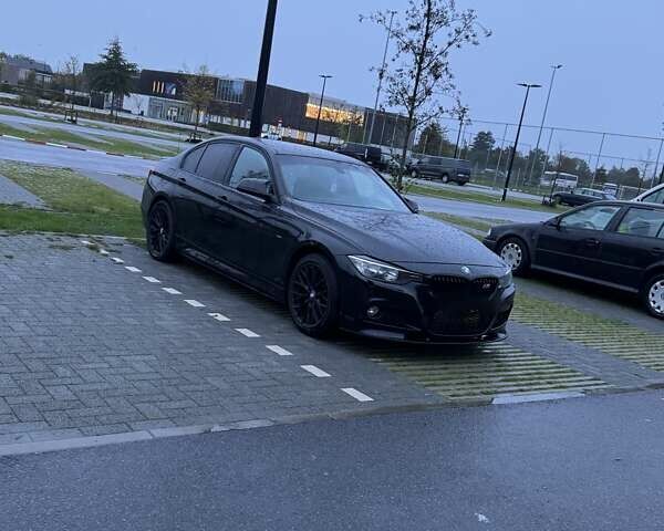 Черный БМВ 3 Серия, объемом двигателя 1.59 л и пробегом 200 тыс. км за 13887 $, фото 1 на Automoto.ua