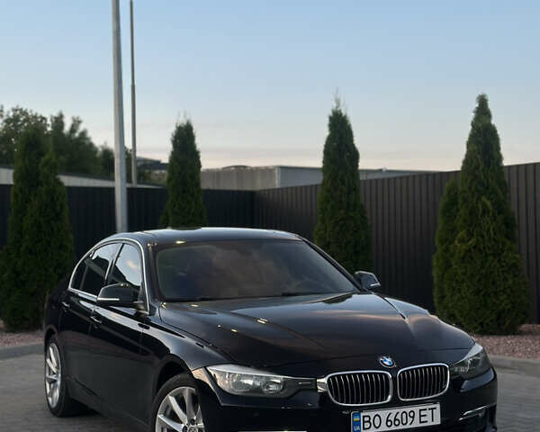 Чорний БМВ 3 Серія, об'ємом двигуна 2 л та пробігом 230 тис. км за 13800 $, фото 1 на Automoto.ua