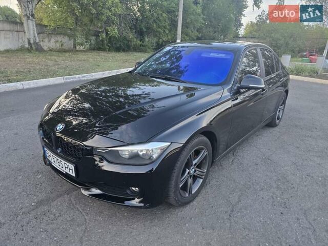 Черный БМВ 3 Серия, объемом двигателя 2 л и пробегом 185 тыс. км за 11800 $, фото 1 на Automoto.ua