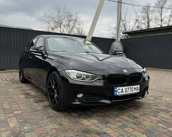 Черный БМВ 3 Серия, объемом двигателя 2 л и пробегом 230 тыс. км за 14700 $, фото 1 на Automoto.ua