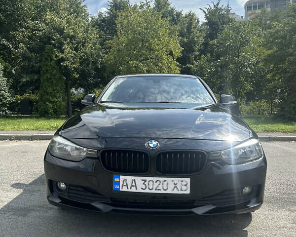 Черный БМВ 3 Серия, объемом двигателя 2 л и пробегом 202 тыс. км за 13000 $, фото 1 на Automoto.ua