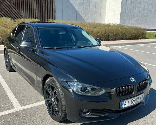 Черный БМВ 3 Серия, объемом двигателя 2 л и пробегом 118 тыс. км за 12000 $, фото 1 на Automoto.ua