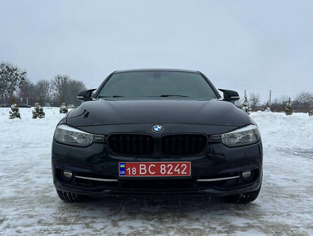 Чорний БМВ 3 Серія, об'ємом двигуна 2 л та пробігом 210 тис. км за 13950 $, фото 1 на Automoto.ua